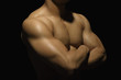 © imagedb.com - Close-up of a muscular man showing his muscles