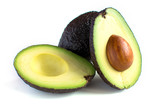 Fototapeta  - A fresh avocado cut in half