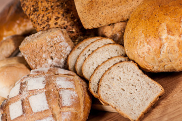 Group of different bread's type on wooden table