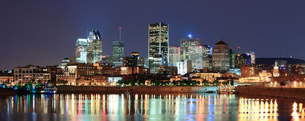 Wall Mural - Montreal over river at dusk