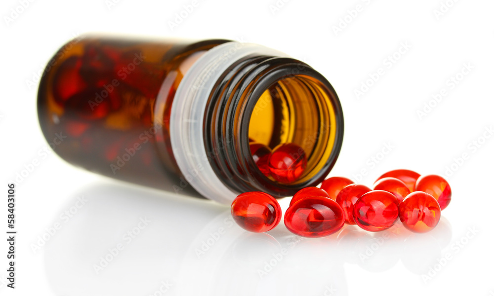 Jar of pills isolated on white