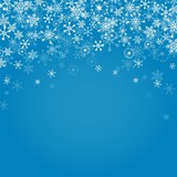 Fototapeta  - Falling snowflakes on blue background