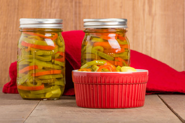 Hot pepper slices canned in mason jars