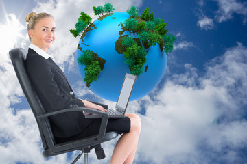 Aufkleber - Composite image of businesswoman sitting on swivel chair with la