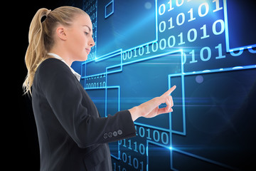 Poster - Composite image of businesswoman pointing somewhere