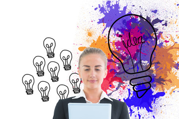 Poster - Composite image of businesswoman holding tablet