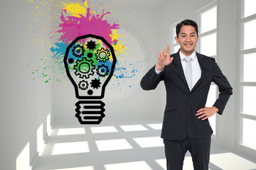 Poster - Composite image of smiling asian businessman pointing