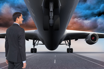 Poster - Composite image of smiling asian businessman