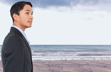 Poster - Composite image of serious asian businessman