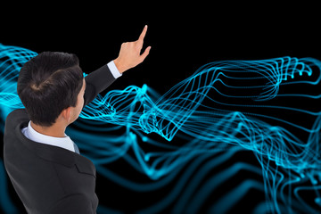 Poster - Composite image of asian businessman pointing