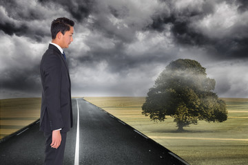 Aufkleber - Composite image of frowning businessman looking down