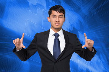 Poster - Composite image of unsmiling businessman holding