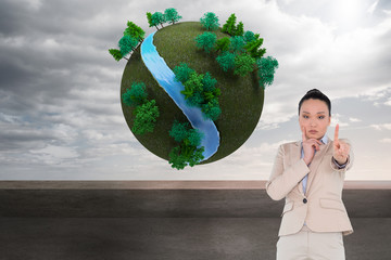 Aufkleber - Composite image of thoughtful asian businesswoman pointing
