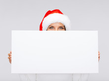 Woman In Santa Helper Hat With Blank White Board