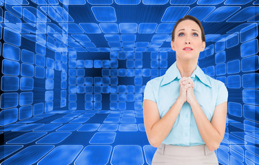 Poster - Composite image of troubled young businesswoman praying