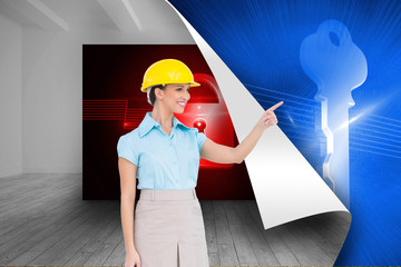Poster - Composite image of smiling attractive architect pointing