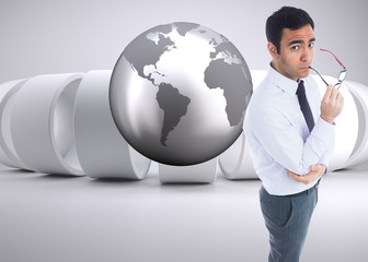 Aufkleber - Composite image of unsmiling businessman holding glasses