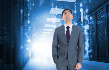 Poster - Composite image of unsmiling businessman standing