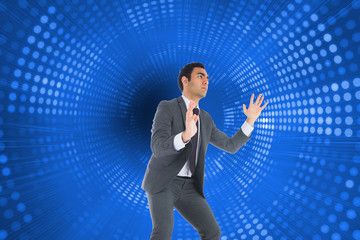 Poster - Composite image of unsmiling businessman catching