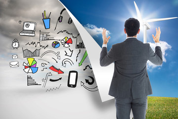 Poster - Composite image of businessman with arms raised