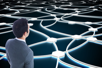 Poster - Composite image of businessman standing