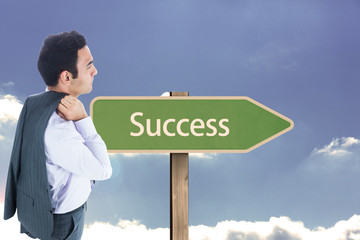 Poster - Composite image of unsmiling businessman standing