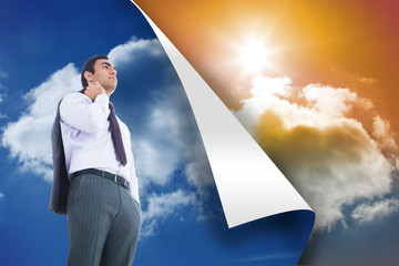 Poster - Composite image of unsmiling businessman standing