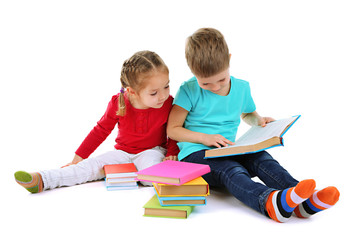 Little children with books isolated on white