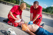 © Riccardo Piccinini - Paramedics succor a man with heart attack