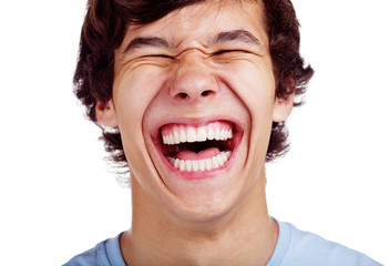 Happy teenage laugh closeup over white