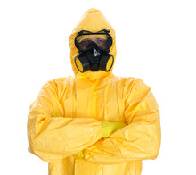 Man In Protective Hazmat Suit. Isolated On White.