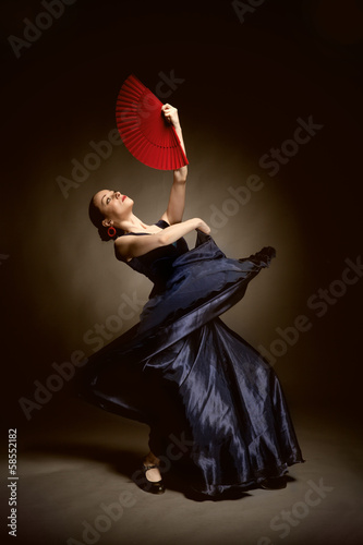 young woman dancing flamenco on black Canvas Print