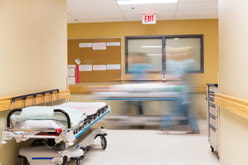 Wall Mural - Nurses Walking In Hospital Corridor