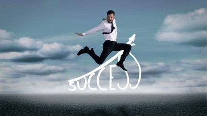 Poster - Handsome businessman jumping in front of success graphic