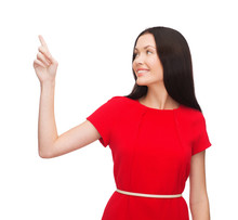 Young Woman In Red Dress Pointing Her Finger
