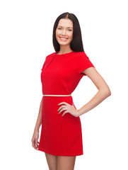 smiling young woman in red dress