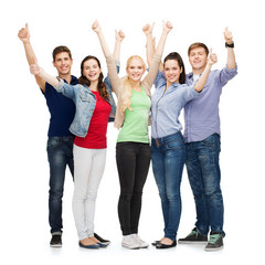 Wall Mural - group of smiling students showing thumbs up