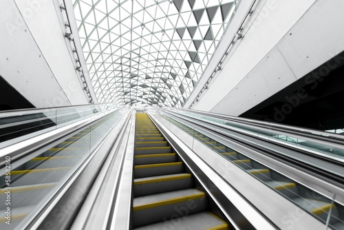 Moving escalator in the business center Tableau sur Toile
