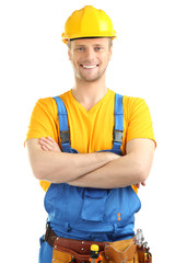 Portrait of young builder isolated on white