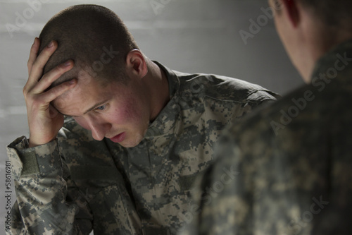 Fotografie, Obraz Emotional military man consoled by peer, horizontal