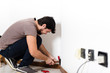 © Eugenio Marongiu - young man electrician bricolage working