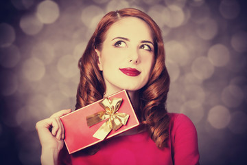 Sticker - Redhead women with gift.