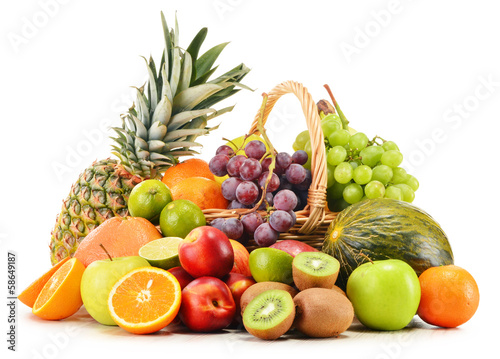 Fotografía Variety of fruits in wicker basket isolated on white