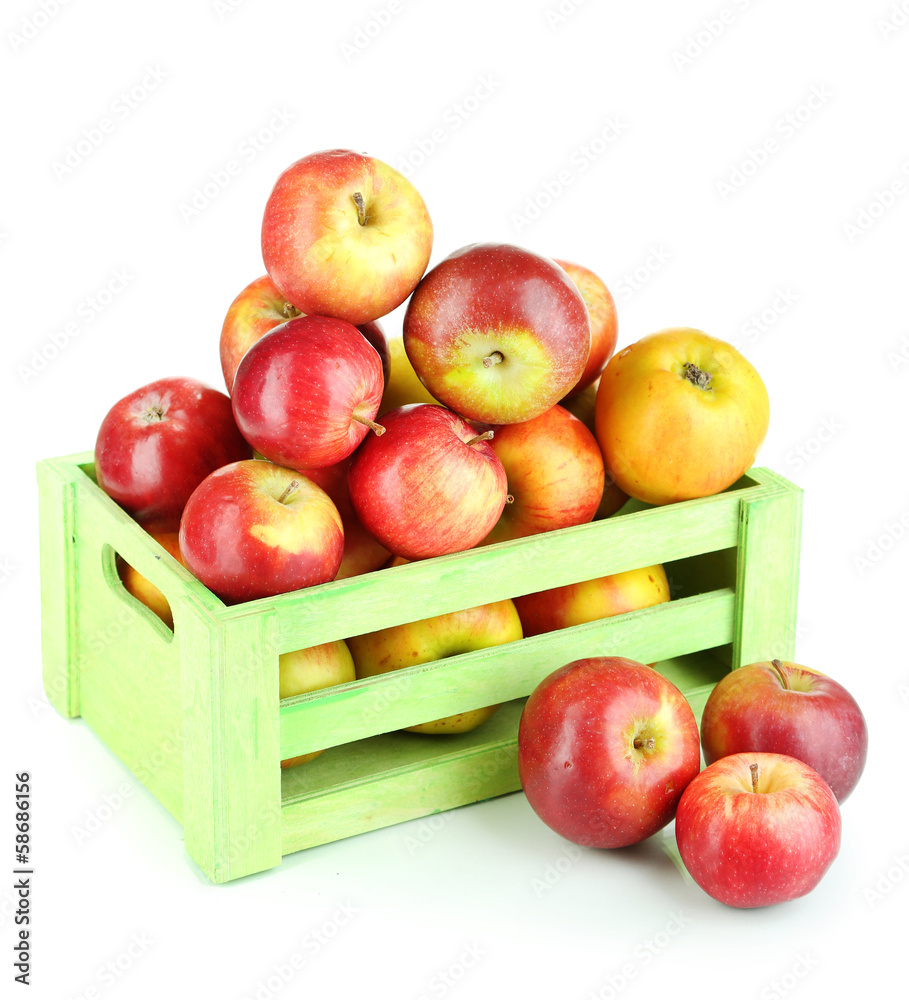 Juicy apples in wooden box isolated on white