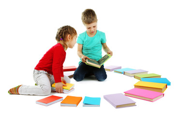 Little children with books isolated on white