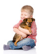 © Ermolaev Alexandr - little boy hugging a dog. isolated on white background