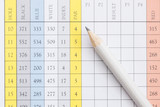 Fototapeta  - Pencil on a golf scorecard