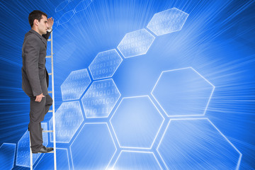 Poster - Composite image of stern businessman standing on ladder