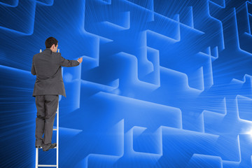 Poster - Composite image of businessman standing on ladder