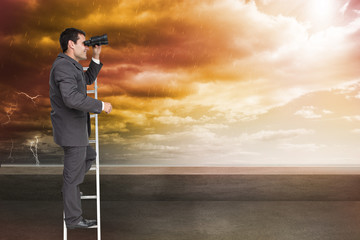 Poster - Composite image of businessman standing on ladder